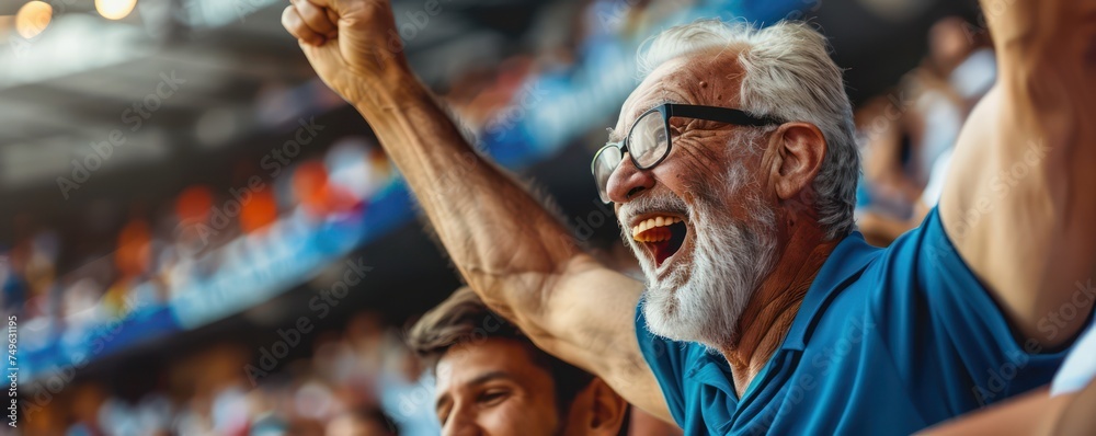 A delighted mature man and his elderly dad cheering on their favorite team together at the stadium during a sports event. - obrazy, fototapety, plakaty 