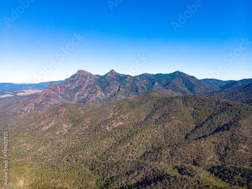 aerial (drone) panorama of mount may in mount barney national park with mount barney and mount maroon in the background  hiking mighty mountain in queensland, australia © Jakub