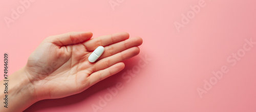 An open hand holds two white pills against a pink background  symbolizing healthcare and medicine. Ai generative illustration