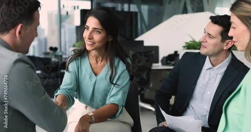 Diverse businesspeople shaking hands accomplish formal meeting in company office, smile handshaking express regard after successful negotiations, conclude deal, succeed agreement. Business, etiquette