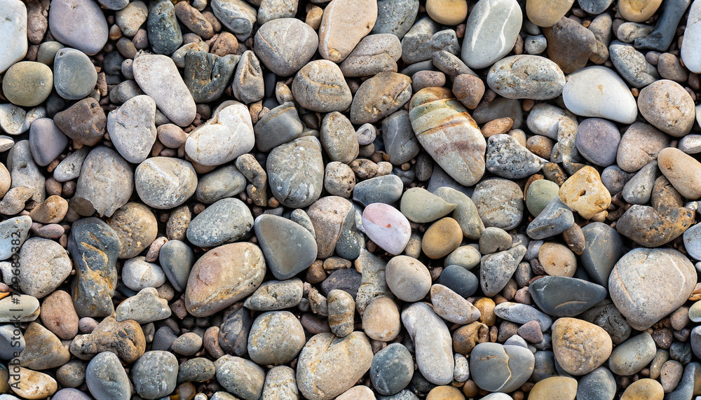 boulder pebble beach stones background seamless texture for design use, Naturally rounded gravel at sea shore Nature background texture pattern boulder pebble beach stones background seamless texture for design use, Naturally rounded gravel at sea shore Nature background texture pattern
