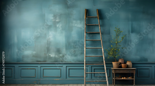 wooden ladder against a textured blue wall