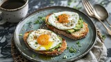 Elegant presentation of avocado toast with eggs on a modern plate, ready for breakfast.