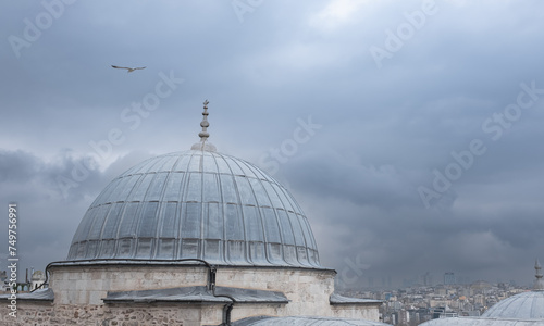 Dome of mosque in Istanbul Turkey. Muslim mosque at cloudy day background.