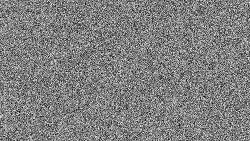 Old Retro TV - Static tv black and white noise caused by bad signal reception. Loop animation