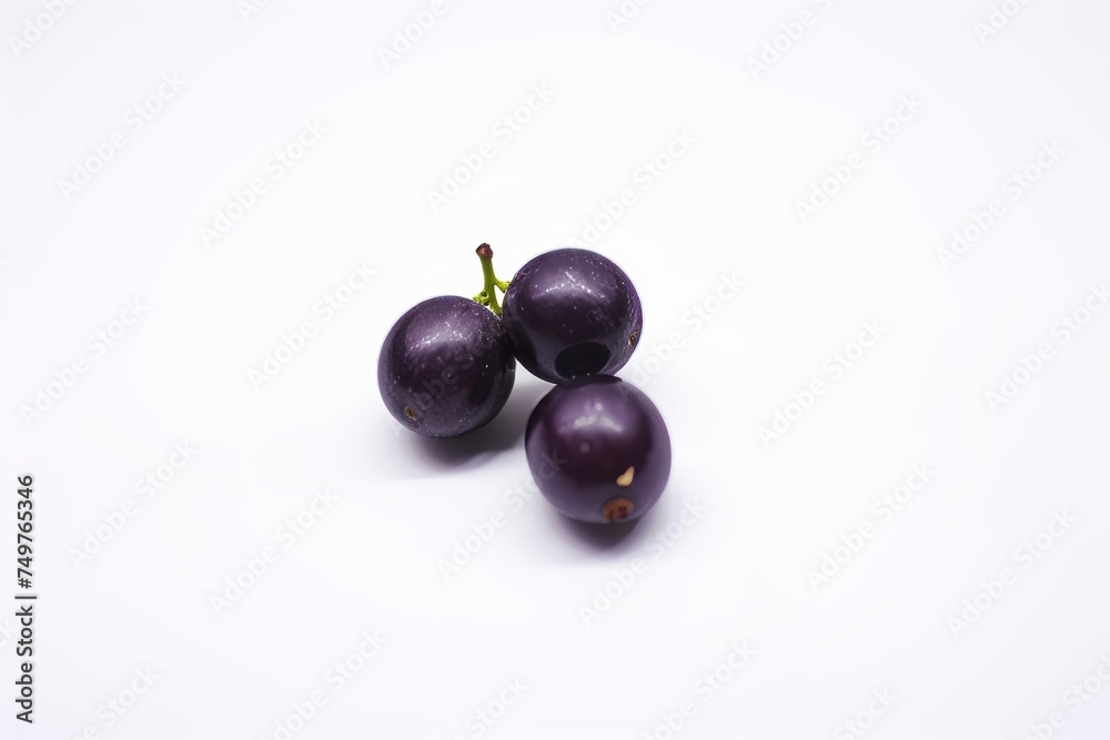 Fresh black currant berries on light background, deep depth of field, food photography Fresh black currant berries on light background, deep depth of field, food photography