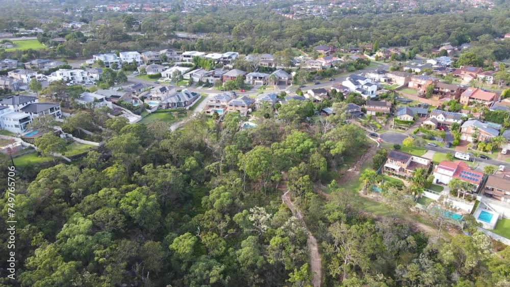 Aerial drone view of Menai, in the Sutherland Shire, South Sydney, NSW Australia on the western side of Alfords Point Road on a sunny morning in March 2024
