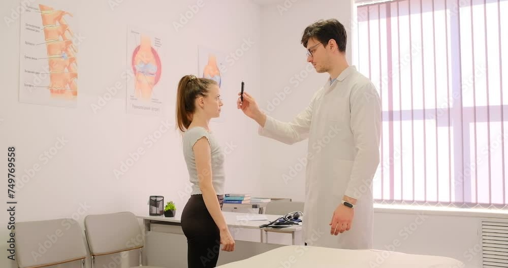 Patient at an appointment with a rehabilitation doctor. Patient at an appointment with a rehabilitation doctor.