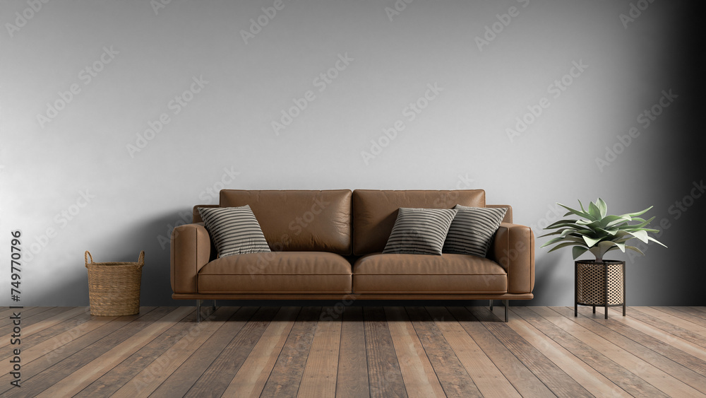 a couch with pillows and a plant on a wooden floor