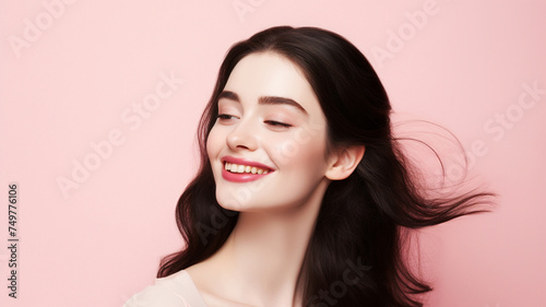 A portrait of a joyful young woman with black hair