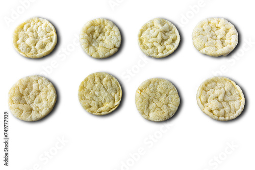 Round rice chips with cheese flavor on a white background photo
