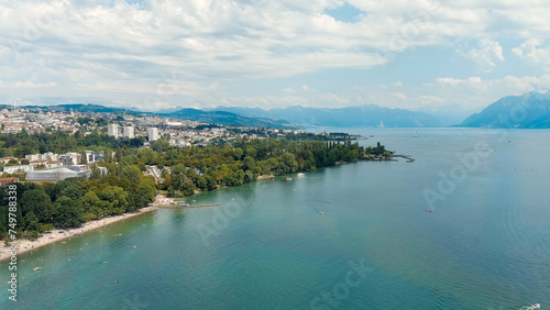 Fototapeta Naklejka Na Ścianę i Meble -  Lausanne, Switzerland. Panorama of the city and view of the city from the embankment. Located on the shores of Lake Geneva. Summer day, Aerial View