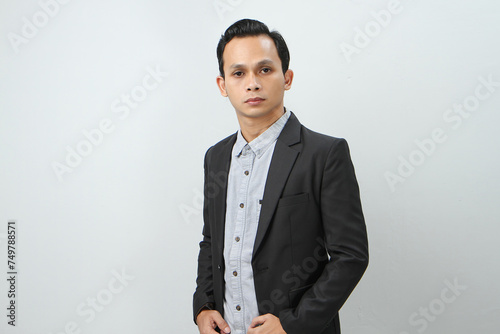 portrait of asian indonesian business man in suit on isolated background