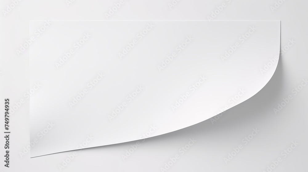 Blank Paper Sheet with a Curved Corner, Isolated on White Background, Top View. Blank Paper Sheet with a Curved Corner, Isolated on White Background, Top View.