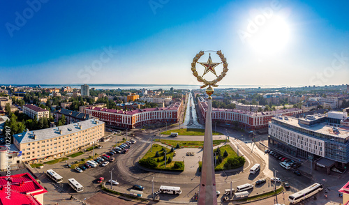 Aerial top view to 17-meter high spire Railway station with golden star framed by wreath. Building are on Gagarin square and Lenin Avenue in center of city. Petrozavodsk is capital of Karelia. Russia photo