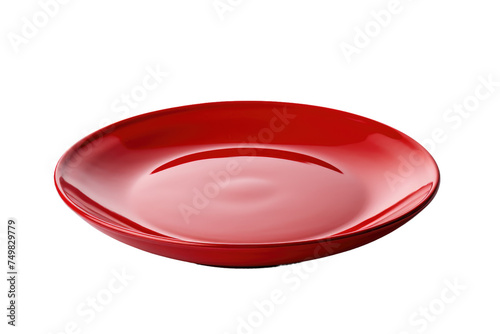 Red Plate. A red plate sits on a stark white background showcasing its vibrant color against the clean minimalistic backdrop. The plate is the focal point drawing attention to its simple design.