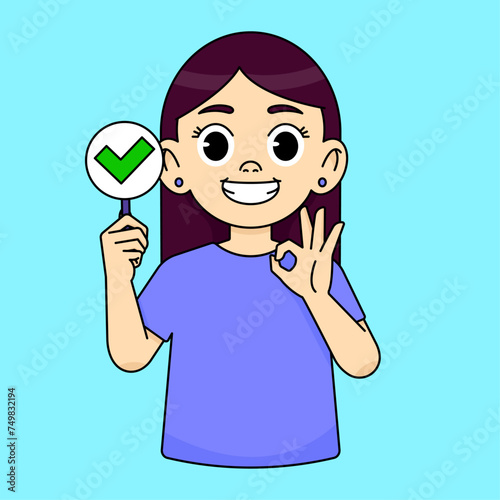 Girl smiling and holding a green check mark sign and showing OK gesture