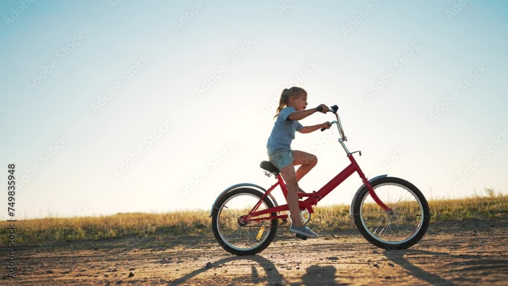 Go everywhere. Safe travel of child on bicycle. Happy child plays in nature everywhere. kid learns to ride bike in park in summer. Freedom and joy of travel. Safe riding. kid playing on bike Go everywhere. Safe travel of child on bicycle. Happy child plays in nature everywhere. kid learns to ride bike in park in summer. Freedom and joy of travel. Safe riding. kid playing on bike