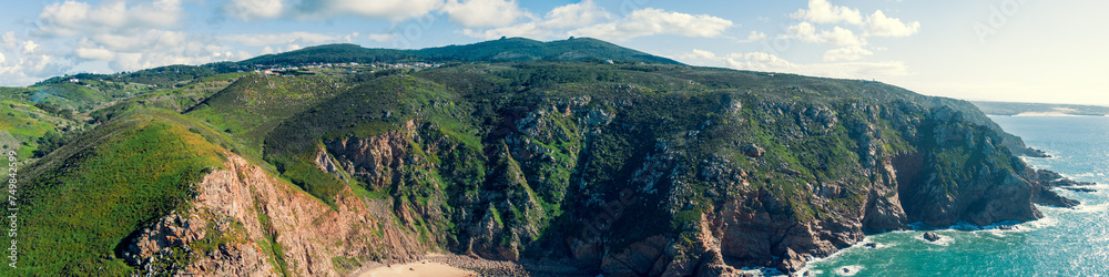Panoramic view of Cabo da Roca. Rocky seascape. Assentiz Beach. Region of Cape Roca, Atlantic Ocean, Portugal. Horizontal banner