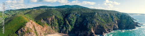 Panoramic view of Cabo da Roca. Rocky seascape. Assentiz Beach. Region of Cape Roca, Atlantic Ocean, Portugal. Horizontal banner photo