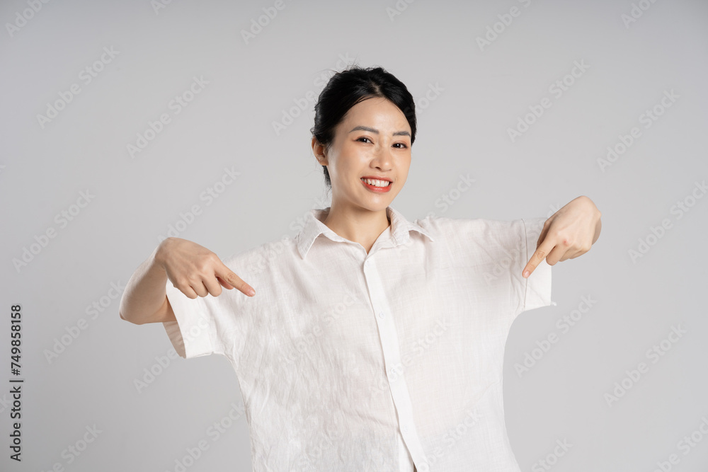 Portrait of beautiful asian woman posing on white background Portrait of beautiful asian woman posing on white background