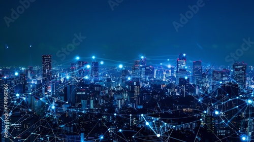 Modern city with wireless network connection and city scape concept.Wireless network and Connection technology concept with city background at night.  photo