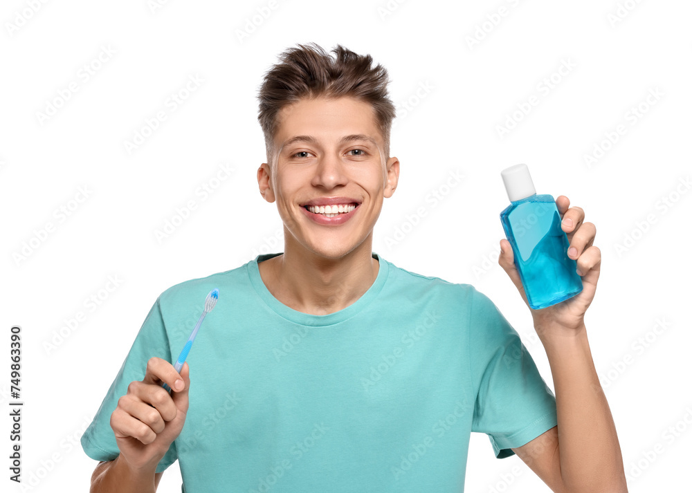 Young man with mouthwash and toothbrush on white background Young man with mouthwash and toothbrush on white background