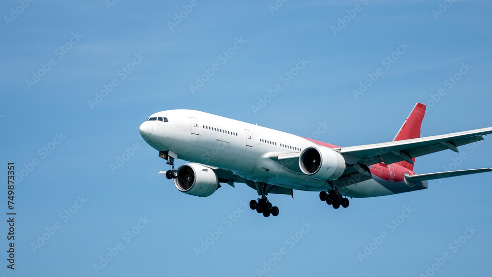 Beautiful airplane in the sky at sunset or dawn Beautiful airplane in the sky at sunset or dawn