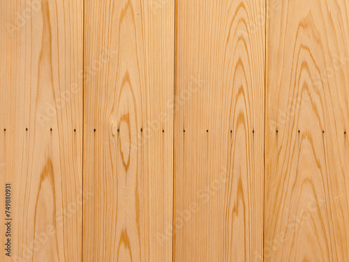 Yellow wooden boards with nails as background