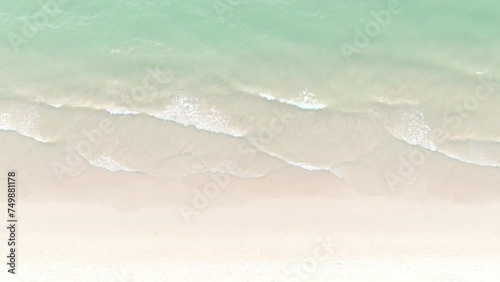 The soft wave water of the sea on the sandy beach background	 photo