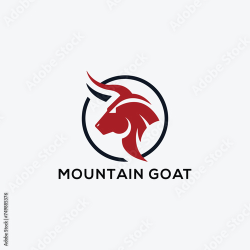 White Goat On The Mountain Logo Design. Goat standing proudly on the top of the mountain Logo Design