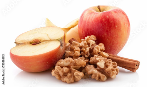 Obraz na płótnie Whole and sliced apples with walnuts and cinnamon stick isolated on white background. Studio food photography for design and print w salonie