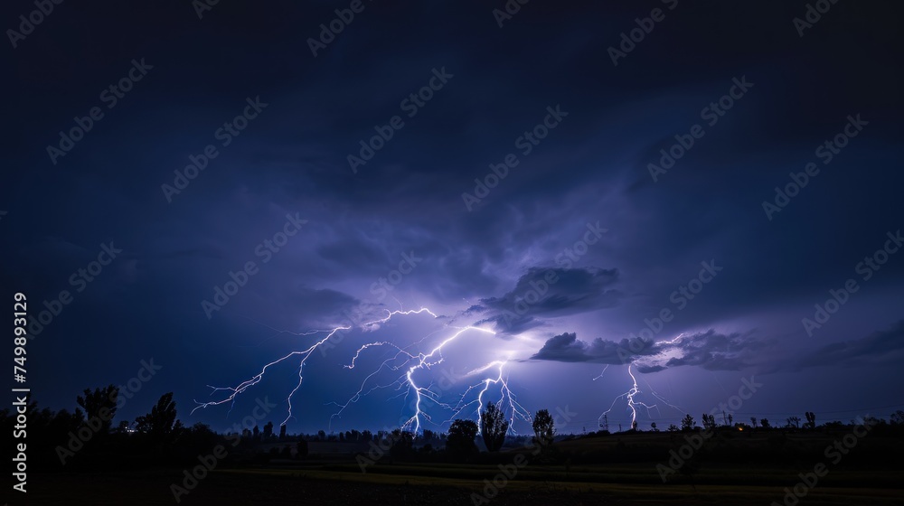 Obraz premium Lightning Strike in the dark sky over the city. Lightning storm over city in purple light