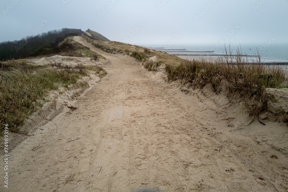 wide path high above the dunes on the north sea Zeeland Netherlands wide path high above the dunes on the north sea Zeeland Netherlands