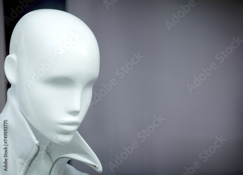 faceless mannequin with a smooth surface, reflecting the relationship between humanity and artificial intelligence
