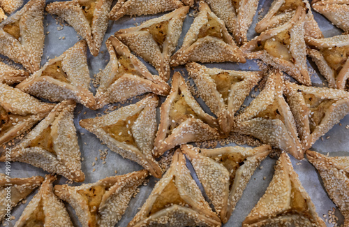 Hamantaschen cookies at the bakery for Purim celebration. © borisbelenky