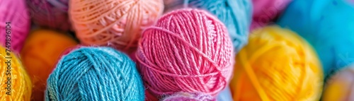 Brightly colored yarn balls in macro, whimsical knitting theme