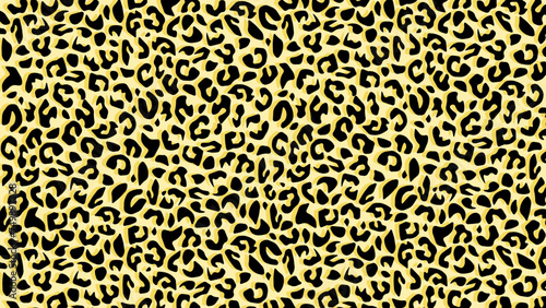 Leopard skin fur texture yellow background 
