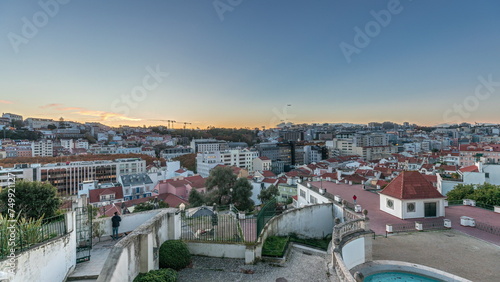 Photos Panorama showing Jardim do Torel day to night timelapse with views to the city center of Lisbon after sunset