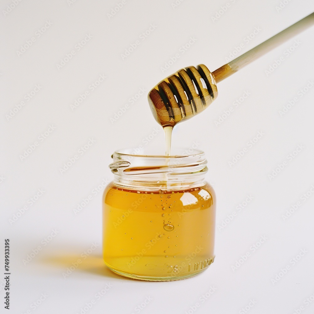 A sleek jar of artisanal honey with a wooden dipper, highlighting natural and organic food themes, suitable for healthy lifestyle branding and natural product advertising A sleek jar of artisanal honey with a wooden dipper, highlighting natural and organic food themes, suitable for healthy lifestyle branding and natural product advertising