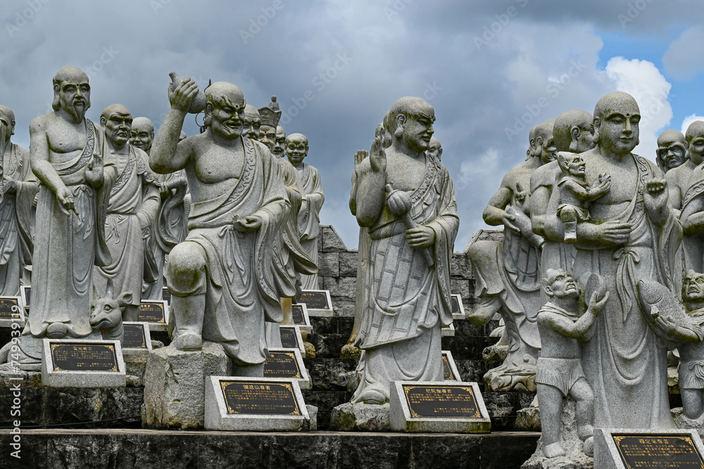 various statues photographed out of 500 statues of worshipers. A very scenic buddha temple in Bintan Indonesia