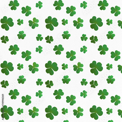 The seamless pattern of green clovers on a white background