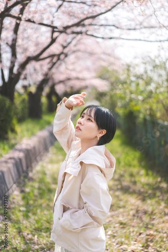 Side view portrait japanese woman with sakura flower travel in japan holidays spring season