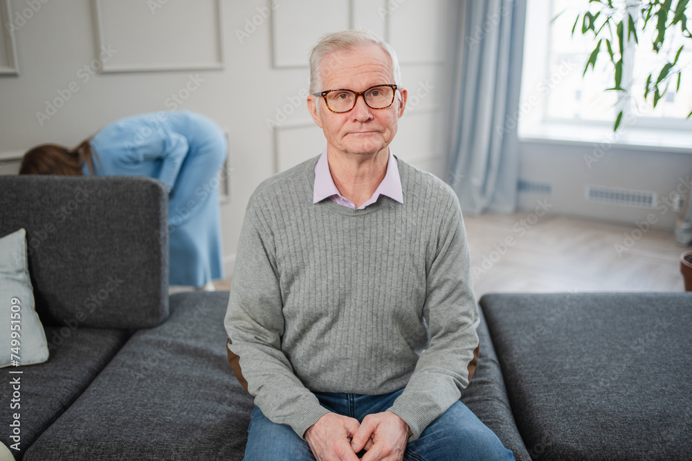 Portrait of confident stylish European middle aged senior man at home. Older mature 70s man smiling. Happy attractive senior grandfather looking camera close up face headshot portrait. Happy people