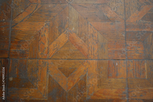 Shabby old wooden parquet  brown parquet board with structure and graphics  art.