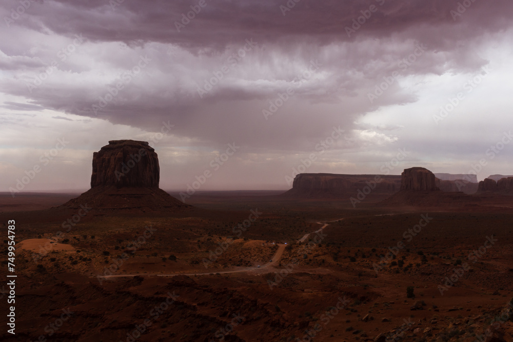The Monument Valley Navajo Tribal Park in Arizona, USA. View of the Merrick Butte, Elephant Butte, and the Artist's Point Monuments during a storm.
