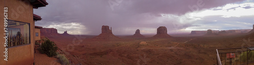 Monument Valley Navajo Tribal Park in Arizona, USA. View of a storm over the Sentinel Mesa, West Mitten Butte, East Mitten Butte, Merrick Butte, the Elephant Butte Monuments and Mitchell Mesa. photo