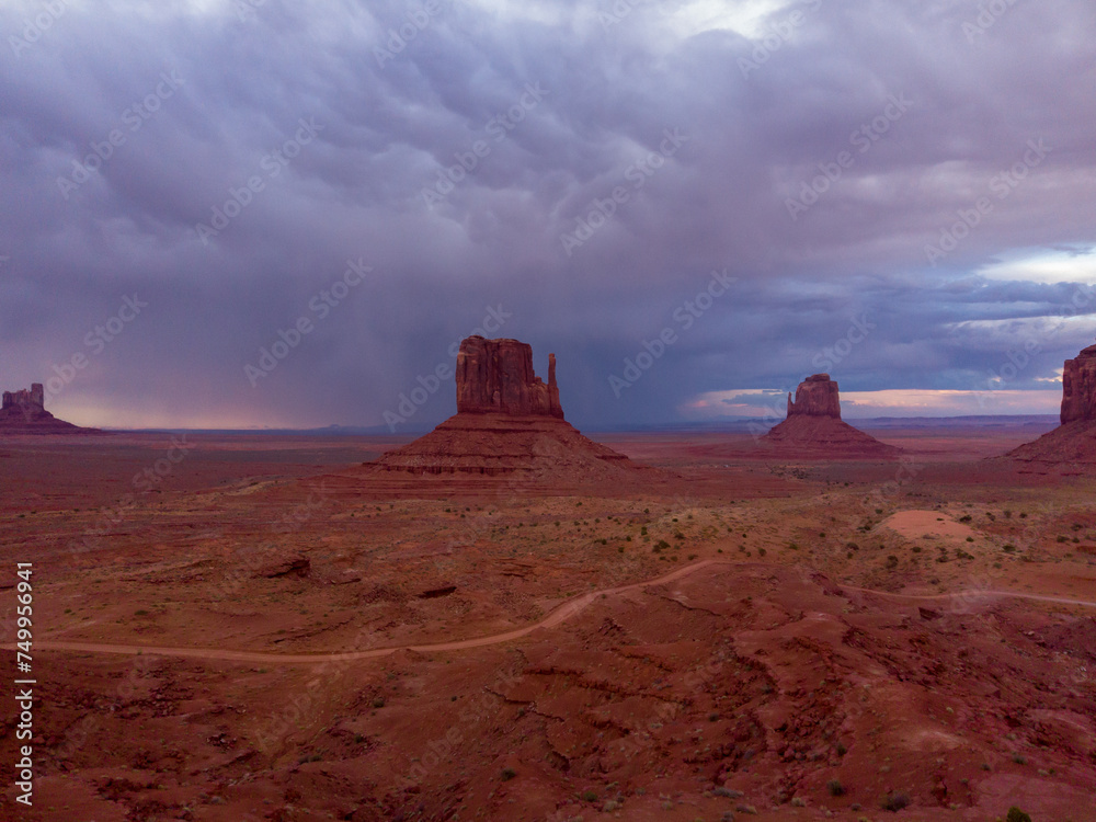 The Monument Valley Navajo Tribal Park in Arizona, USA. View of the West Mitten Butte, East Mitten Butte, and Merrick Butte Monuments.