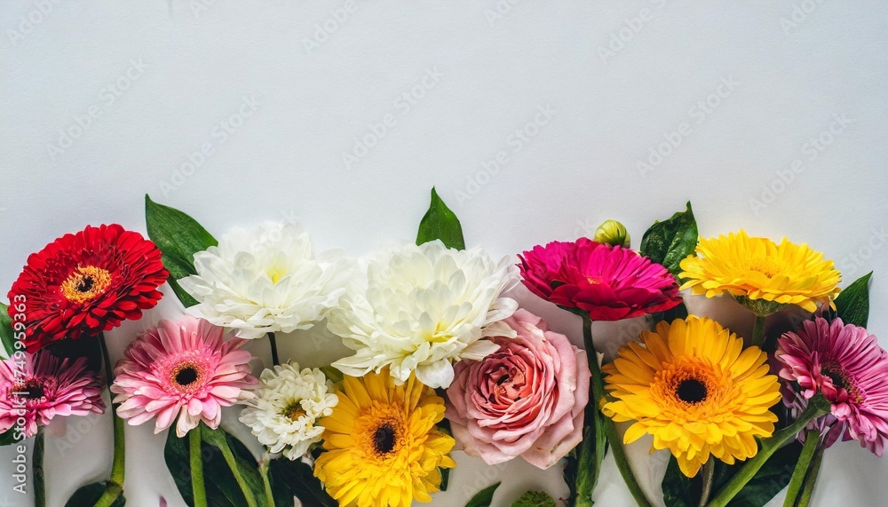 frame with colorful flowers on clear white background greeting card design for holiday mother s day easter valentine day springtime composition with copy space flat lay top view