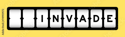 Black color in word invade on slot banner with yellow color background